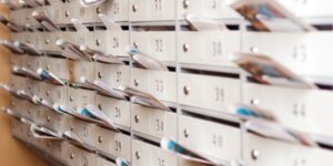 Mail sticks out of mailboxes.